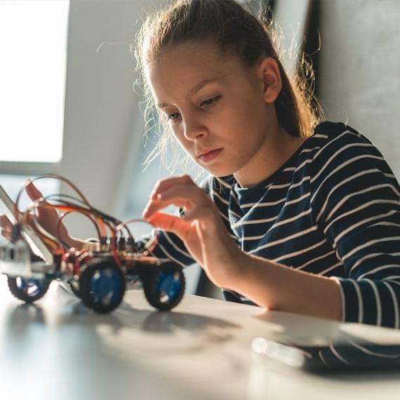 High school student doing STEM Experiment - Connections Academy